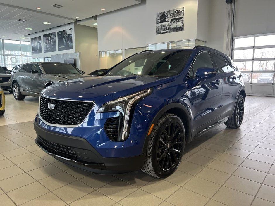 3/4 front view of a used Cadillac XT4.