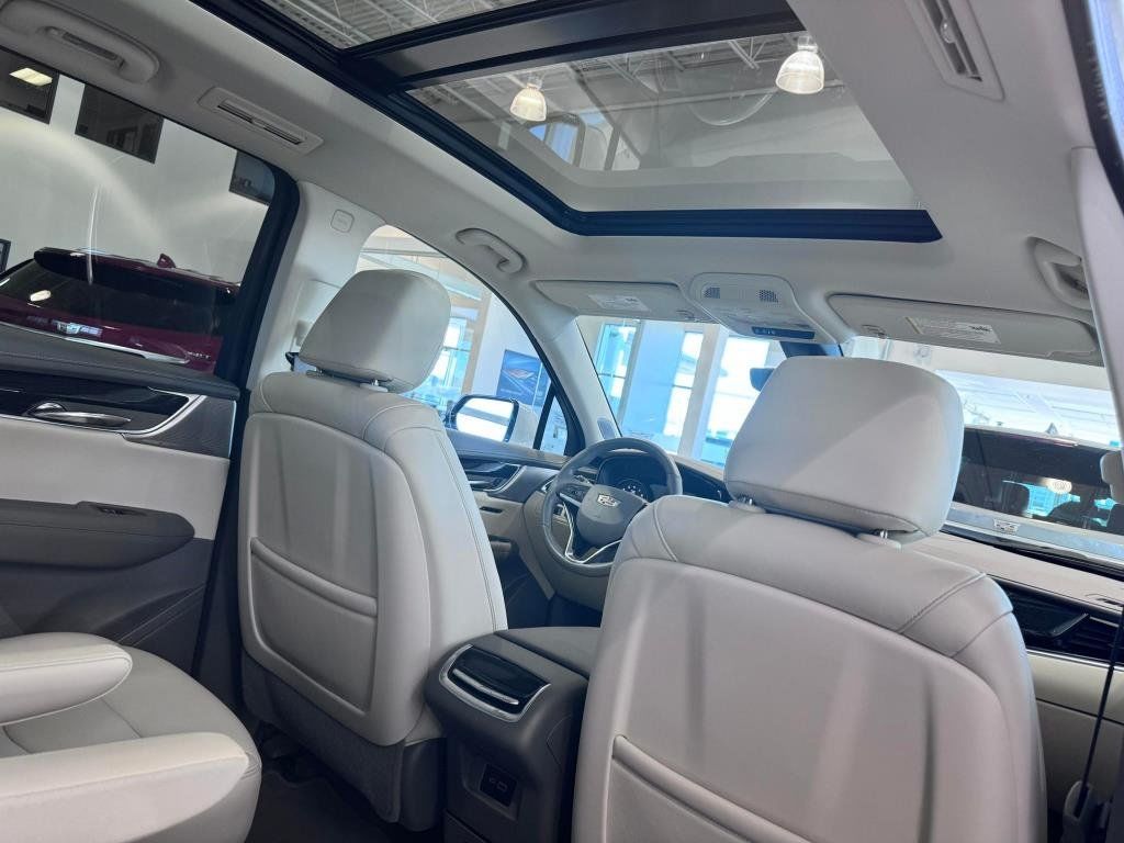 Rear view of the front seats of a used Cadillac XT6.