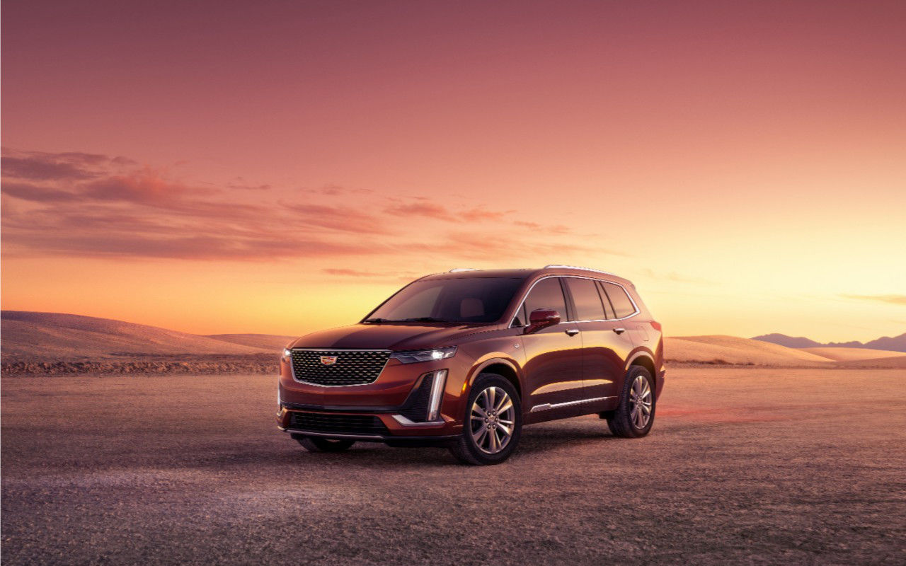 front side view of a 2023 Cadillac XT6 in the desert