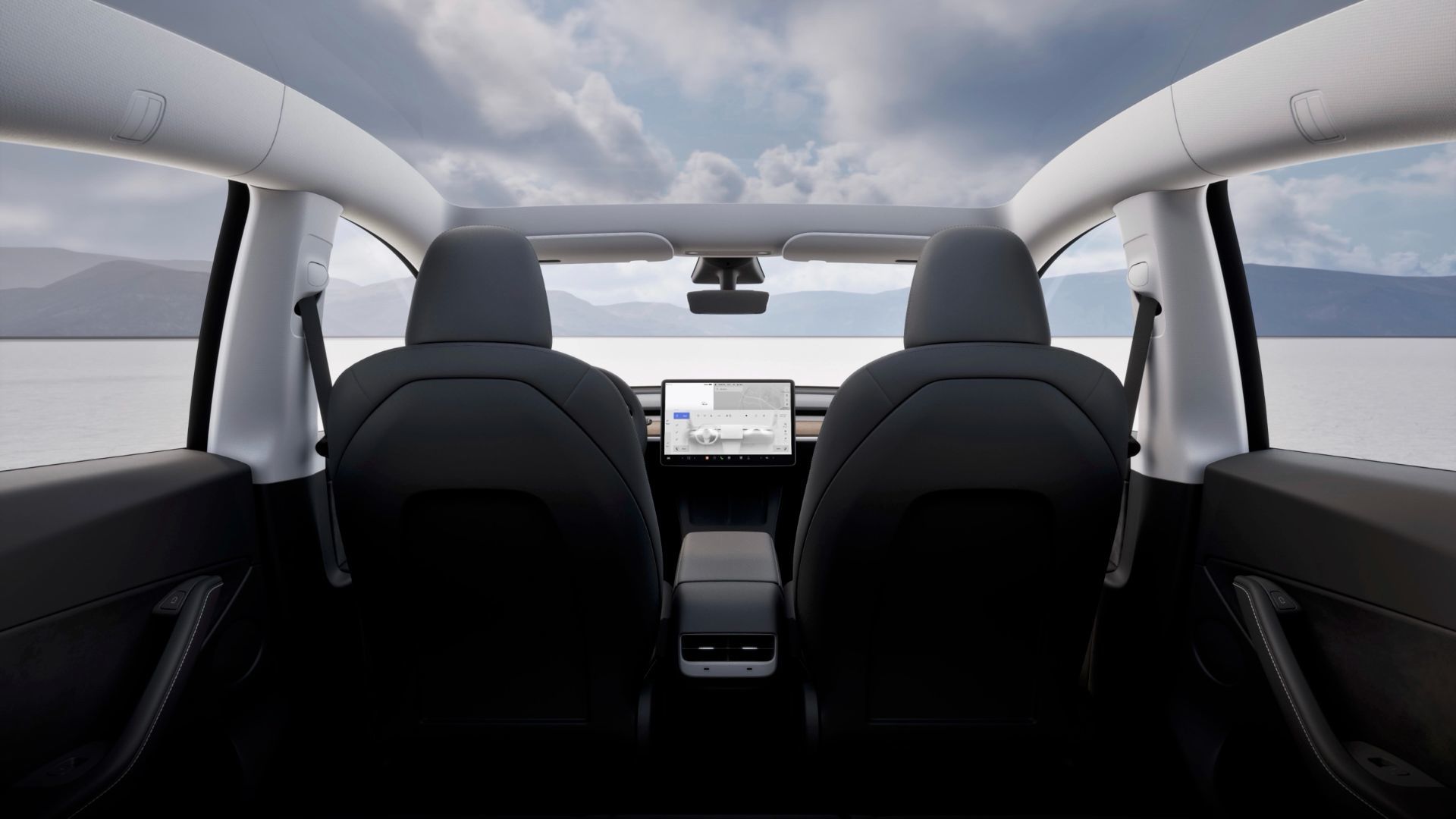 View of the seats and panoramic roof of the Tesla model Y 2024.