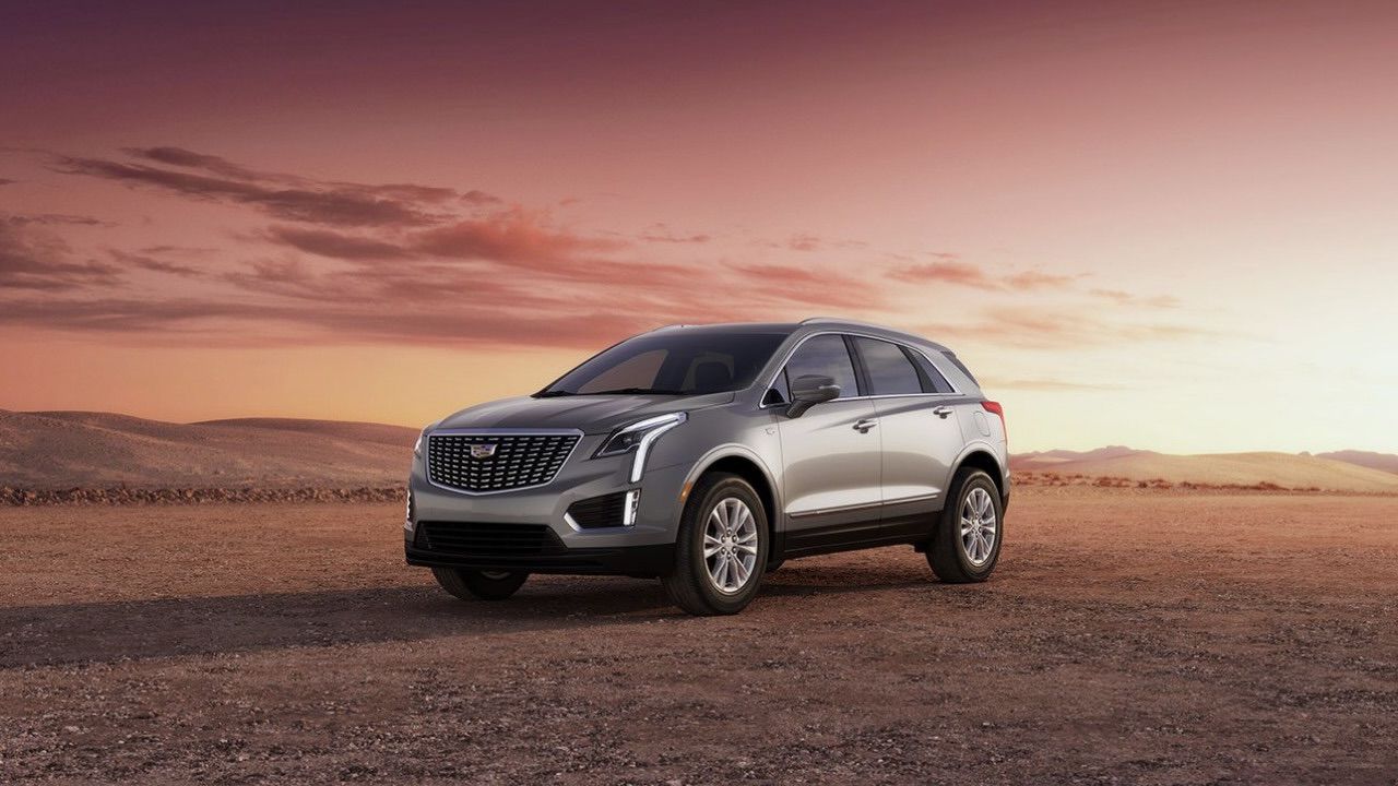 The Cadillac XT5 parked at sunrise.