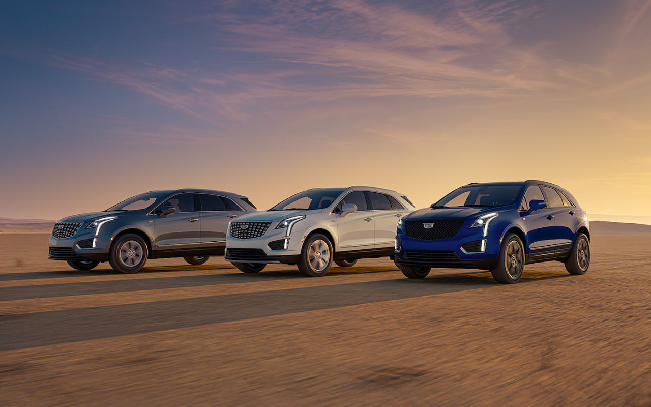 front side view of a trio of 2025 Cadillac XT5 in the desert