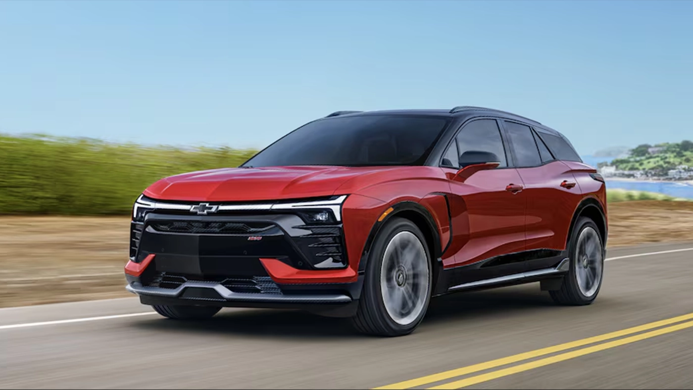 Three-quarter front and side view of the 2026 Chevrolet Blazer EV on the road at full power