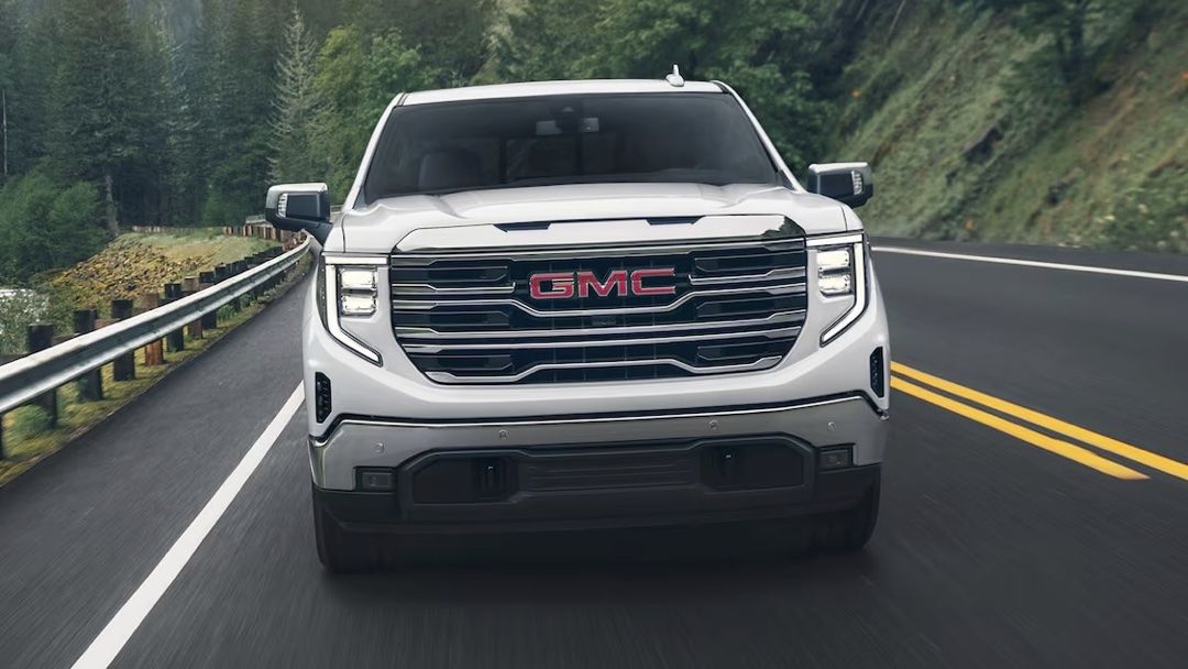 Front view of the GMC Sierra 1500 on the road.