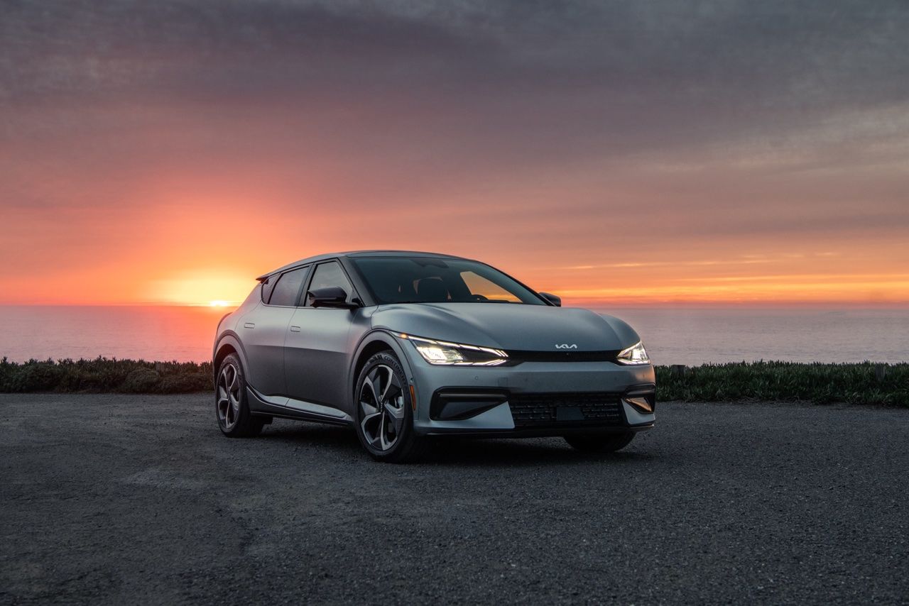 The Kia EV6 parked at sunset.