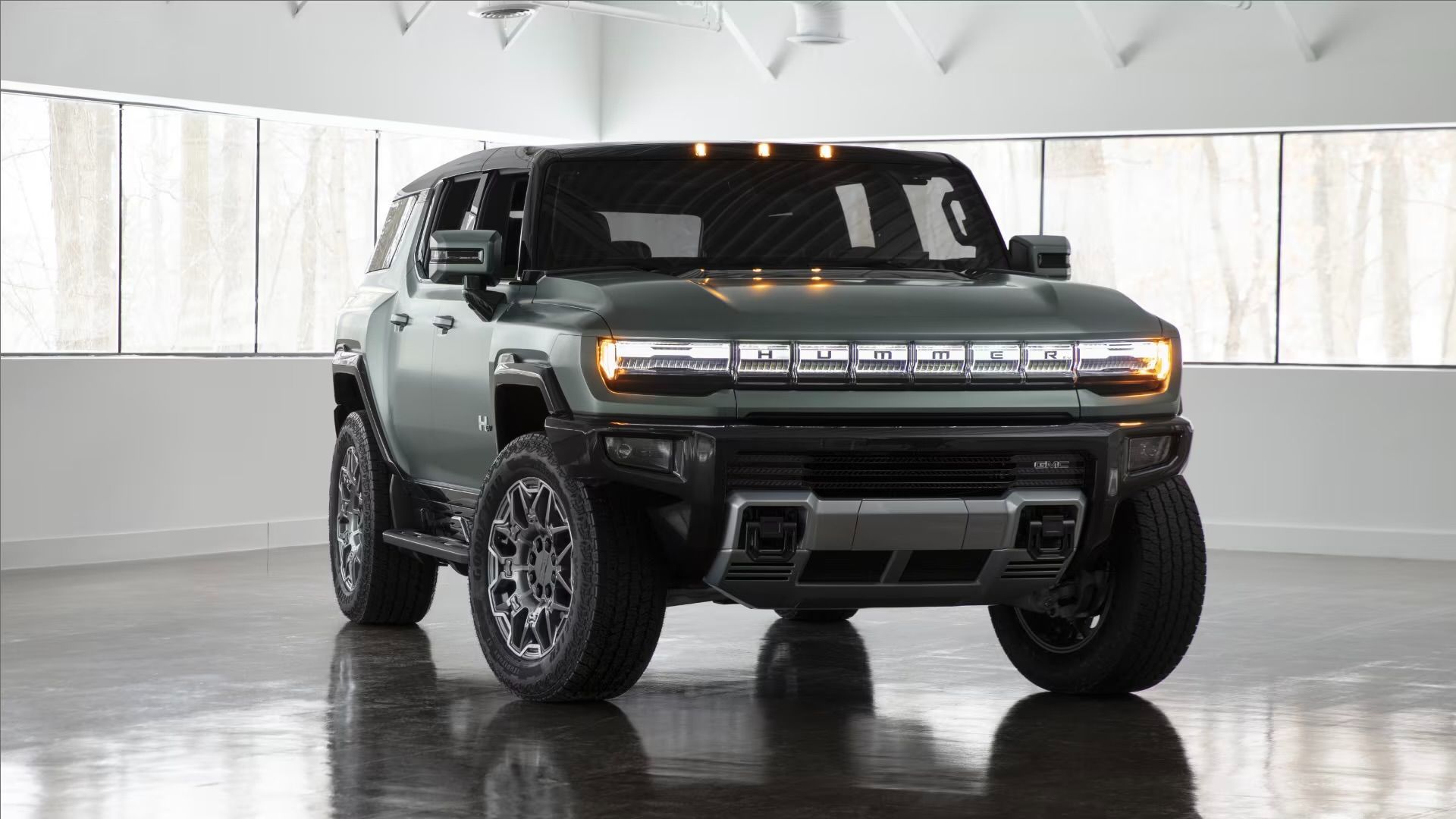 The Hummer EV 2025 SUV parked in an underground garage.