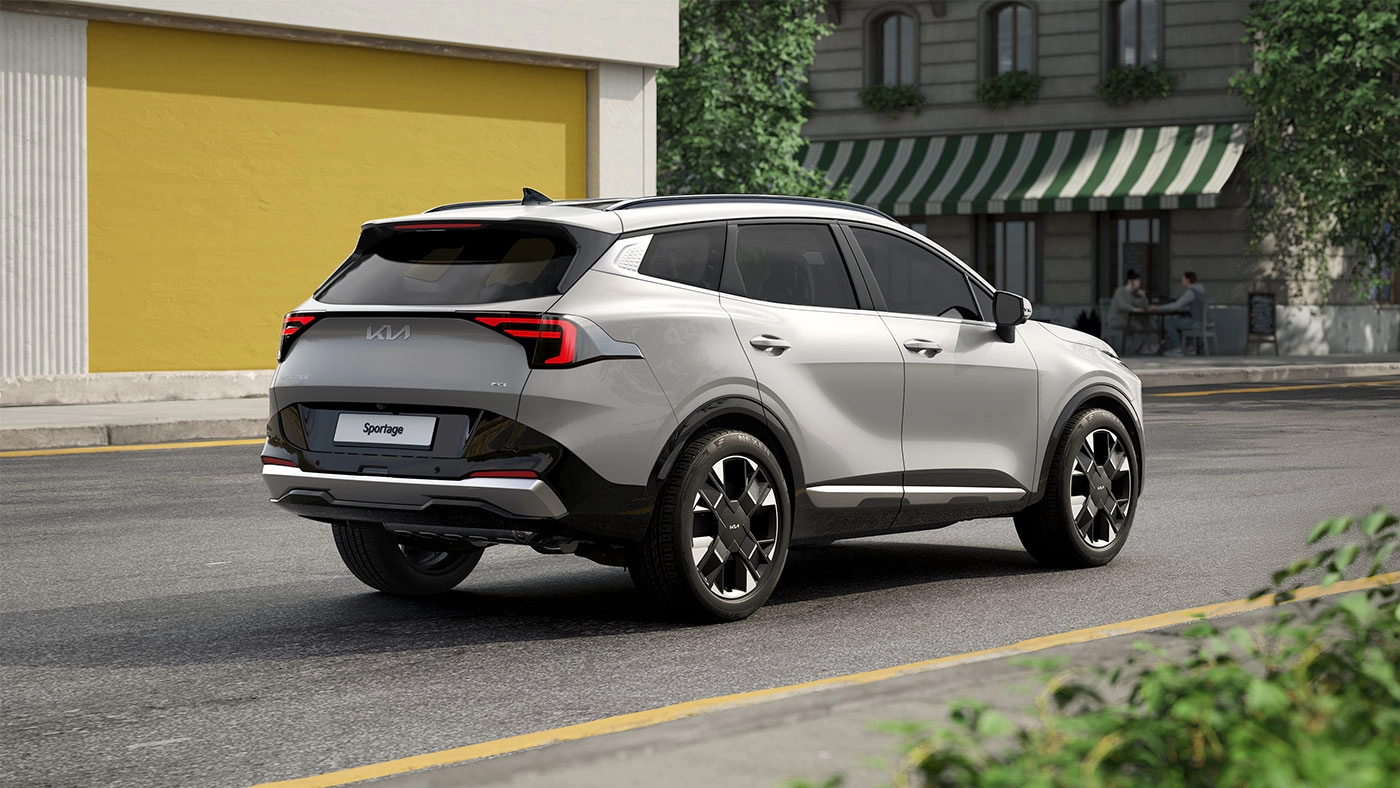 Rear view of the 2026 Kia Sportage parked on the side of the road