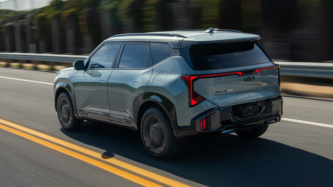 Rear view of the 2027 Kia Seltos on the road