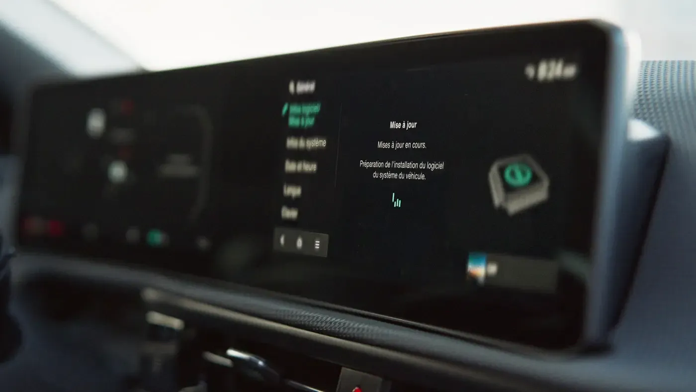 &Eacute;cran multim&eacute;dia du Kia Sportage 2026 affichant le menu des mises &agrave; jour.