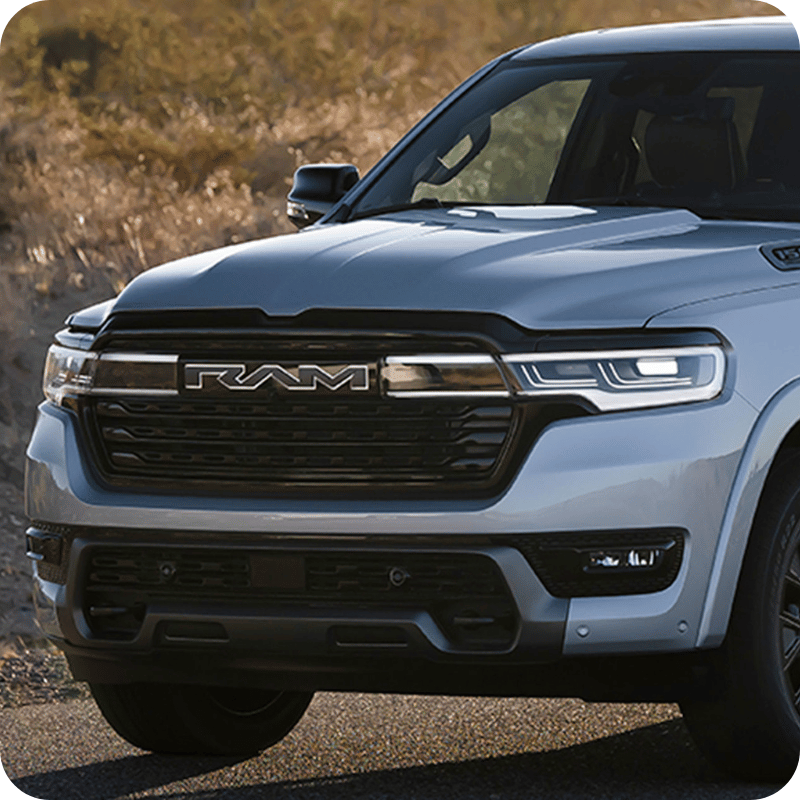Grille of a silver Ram 1500 REV.