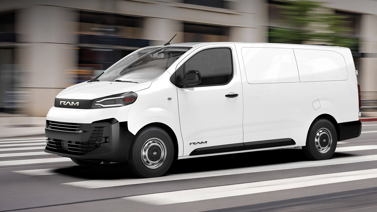 Side view of the 2027 RAM ProMaster City on the road at full power