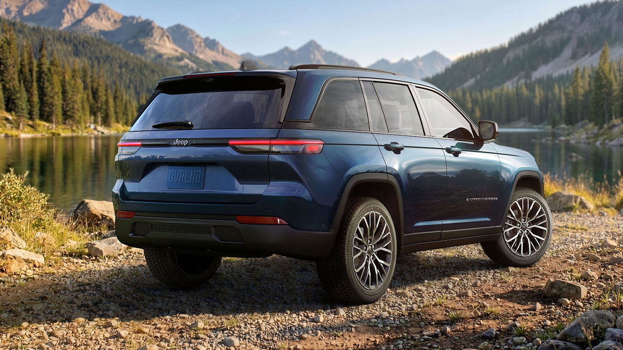 Rear view of the 2027 Jeep Grand Cherokee near a lake