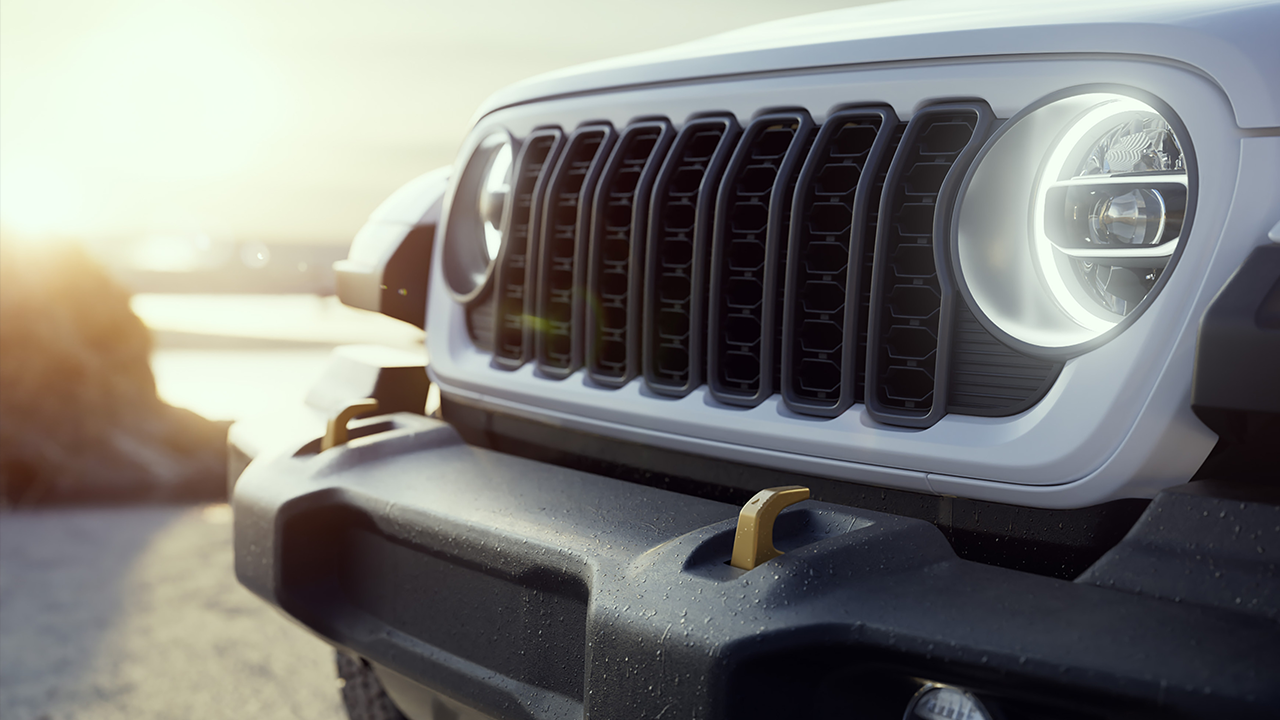Close-up view of the headlight on the 2026 Jeep Wrangler