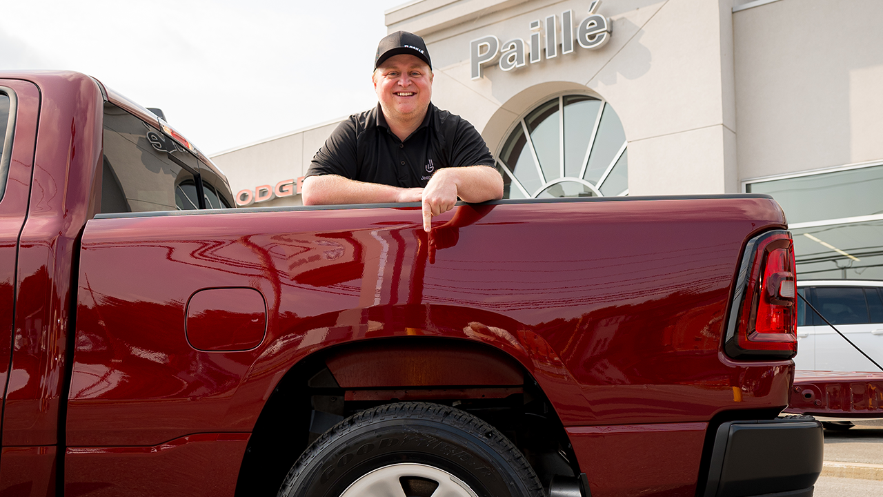 View of a Paillé salesperson inside the cab of a new RAM truck