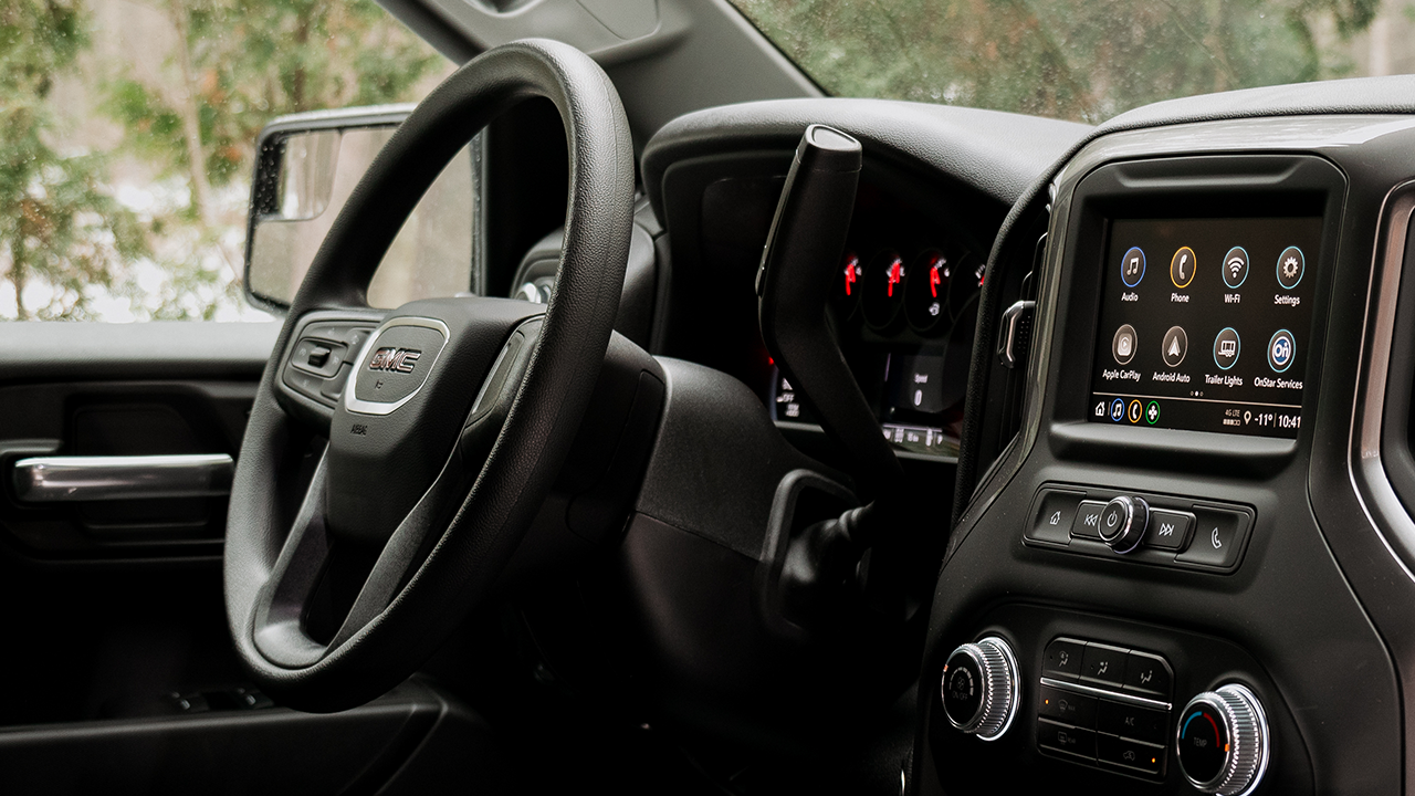 Interior view of the 2027 GMC Sierra and its dashboard