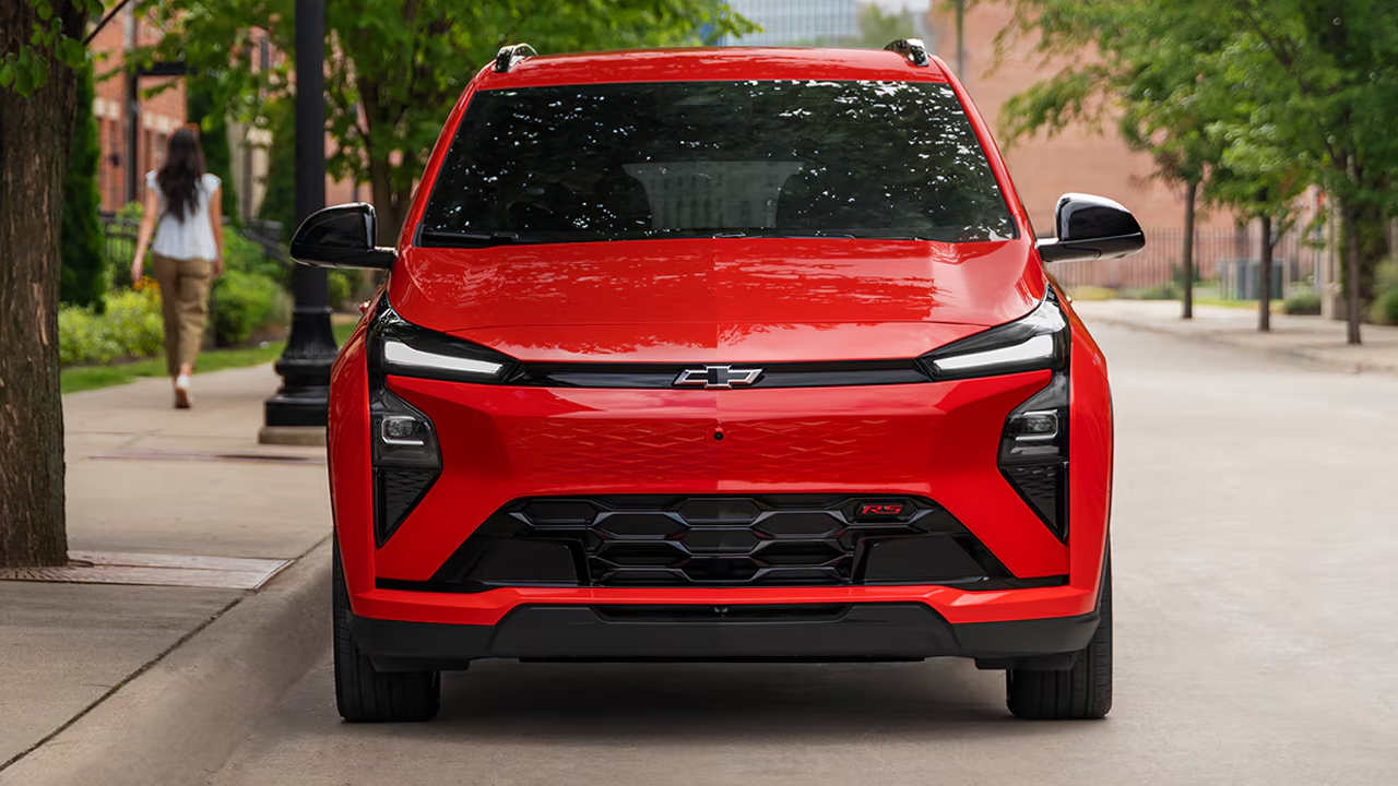 Front view of the 2027 Chevrolet Bolt parked on the side of the street