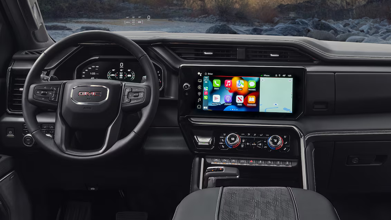 Interior view of the 2026 GMC AT4 and its dashboard