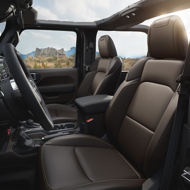Interior of the Jeep Wrangler Sarge with Cattle Tan and Khaki Green leather seats.