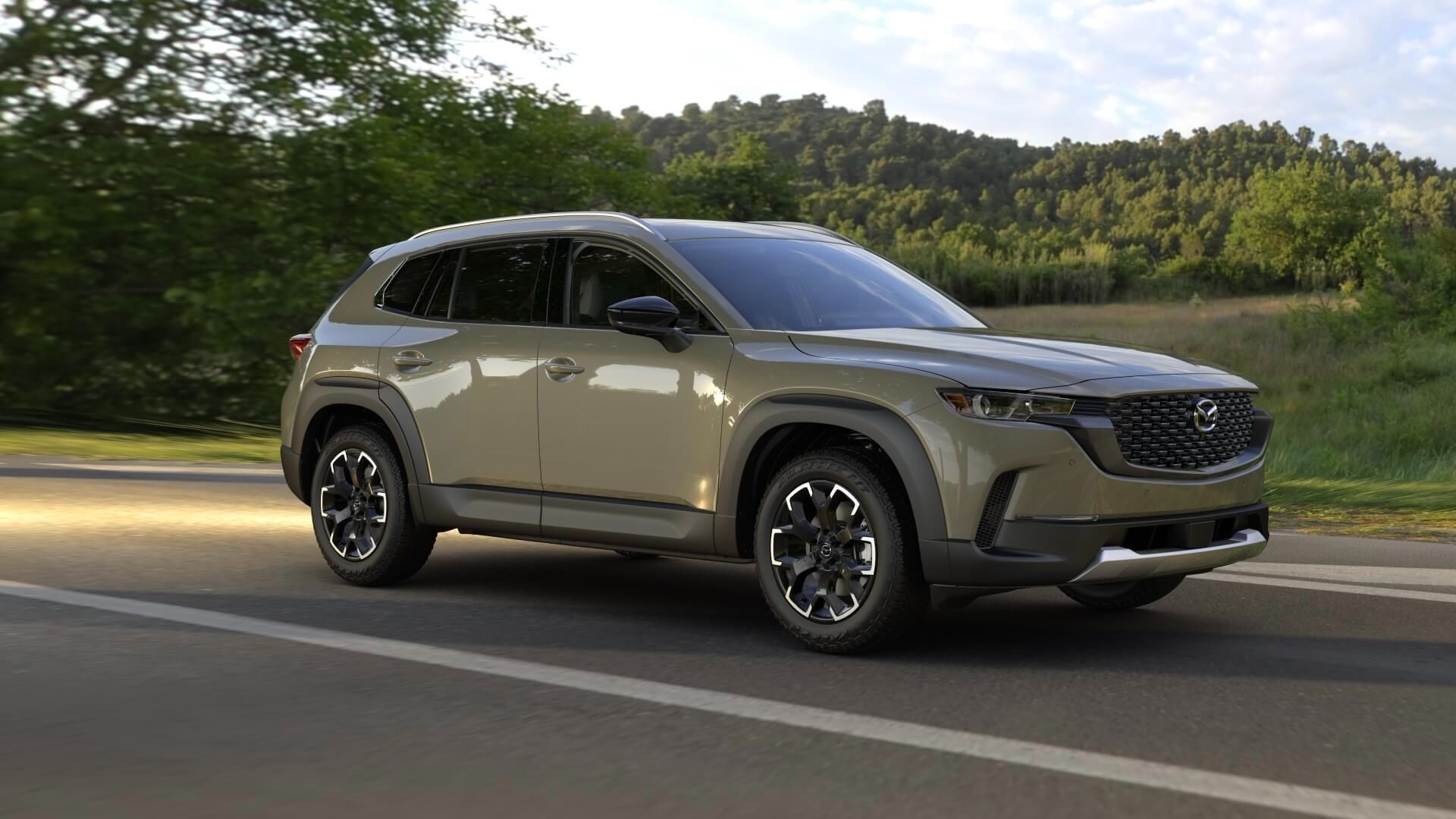The 2024 Mazda CX-50 on the open road, where style meets performance.