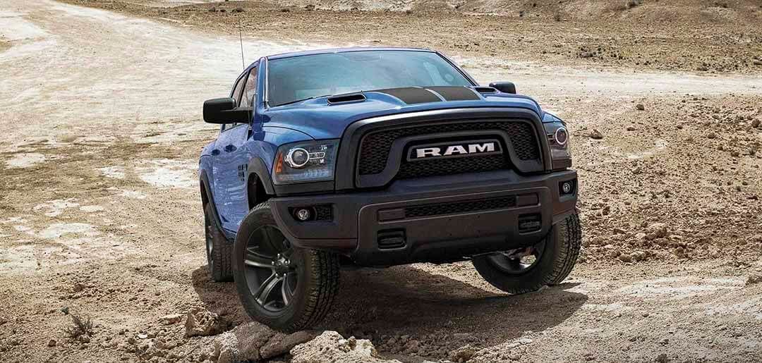 Front view of a RAM 1500 Classic truck parked outside.