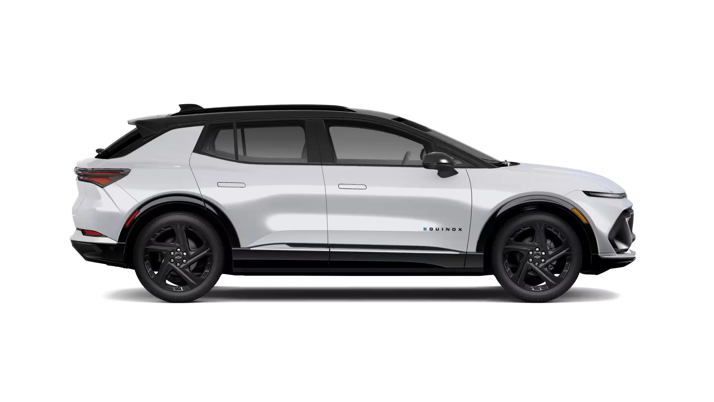 Chevrolet Equinox EV RS 2026 blanc en profil, jantes noires de 21 pouces et accents sport