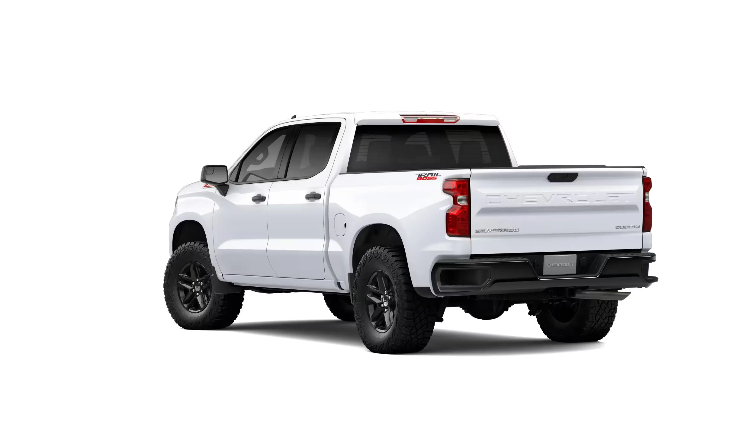 White Chevrolet Silverado 1500 Custom Trail Boss, rear three-quarter off-road view