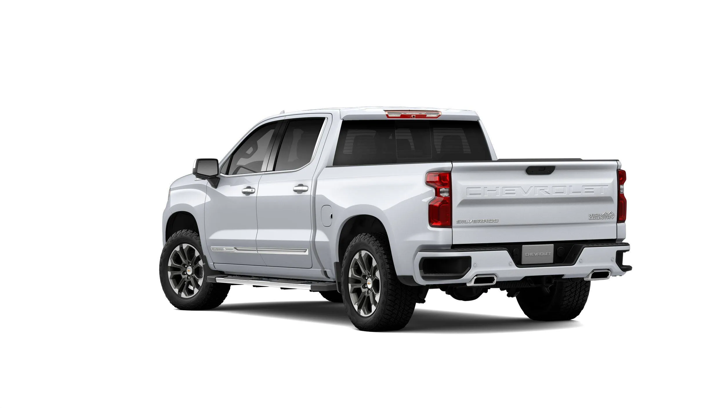 White Chevrolet Silverado 1500 High Country, luxury finish in rear three-quarter view