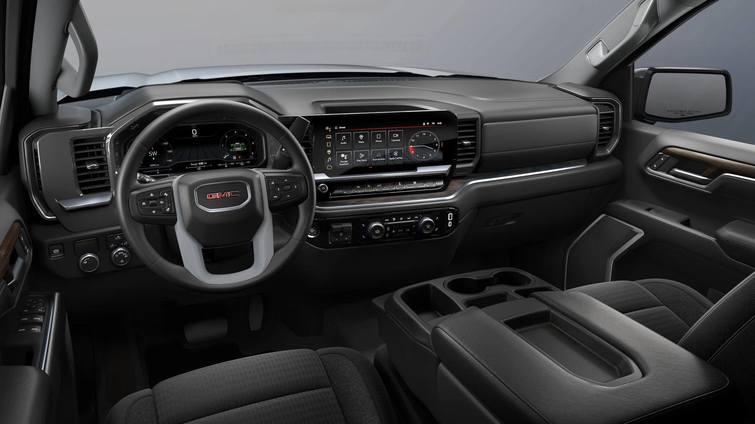 Int&eacute;rieur du GMC Sierra 1500 SLE 2026 avec &eacute;cran central et tableau num&eacute;rique.