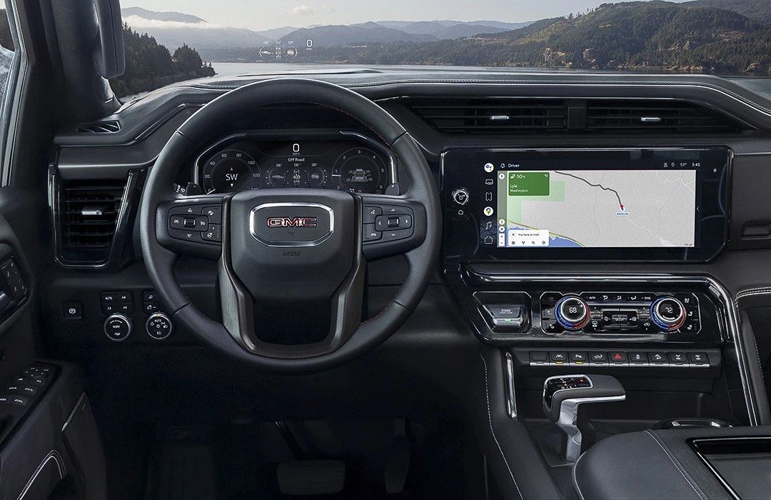 GMC interior with steering wheel and navigation display, showing test-drive checkpoints.