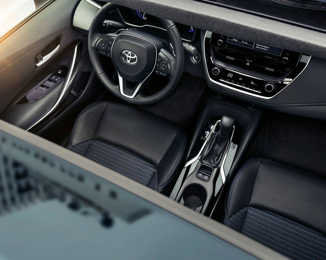 panoramic roof view of the 2022 Toyota Corolla showing the cockpit of the vehicle