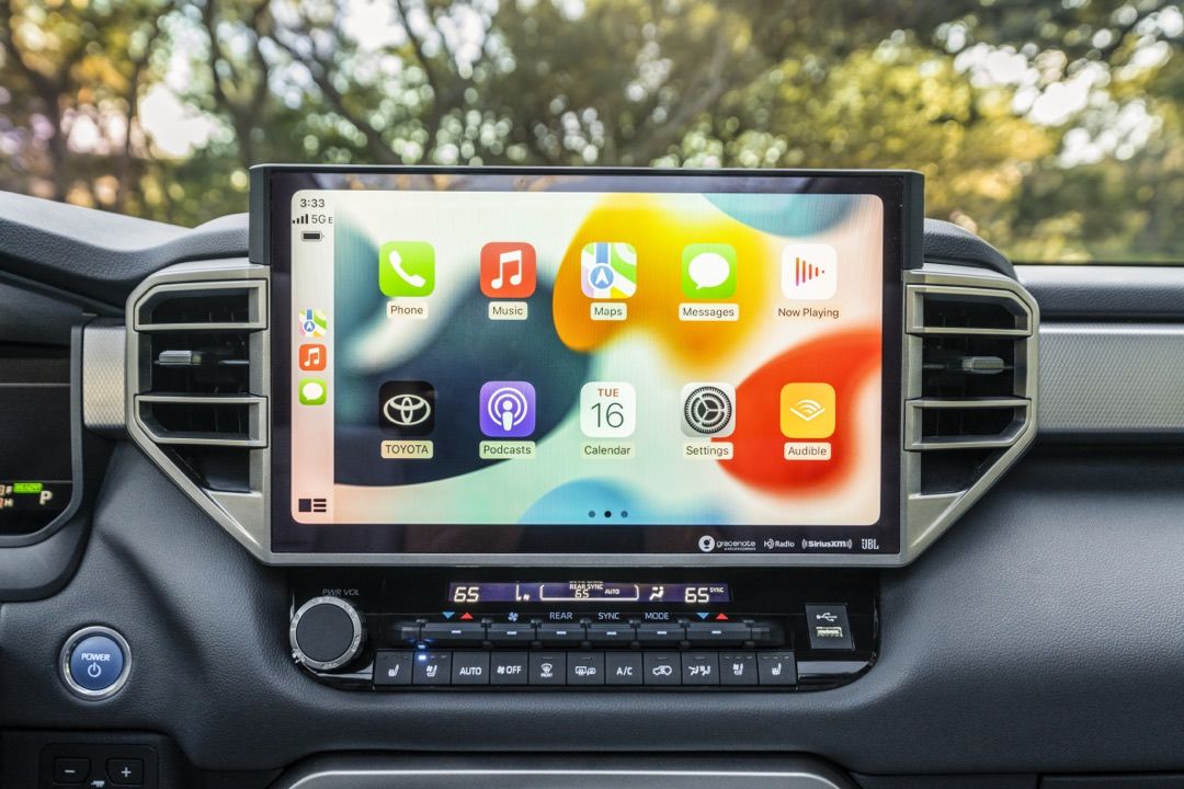 touch screen displaying the Apple CarPlay/Android Auto application