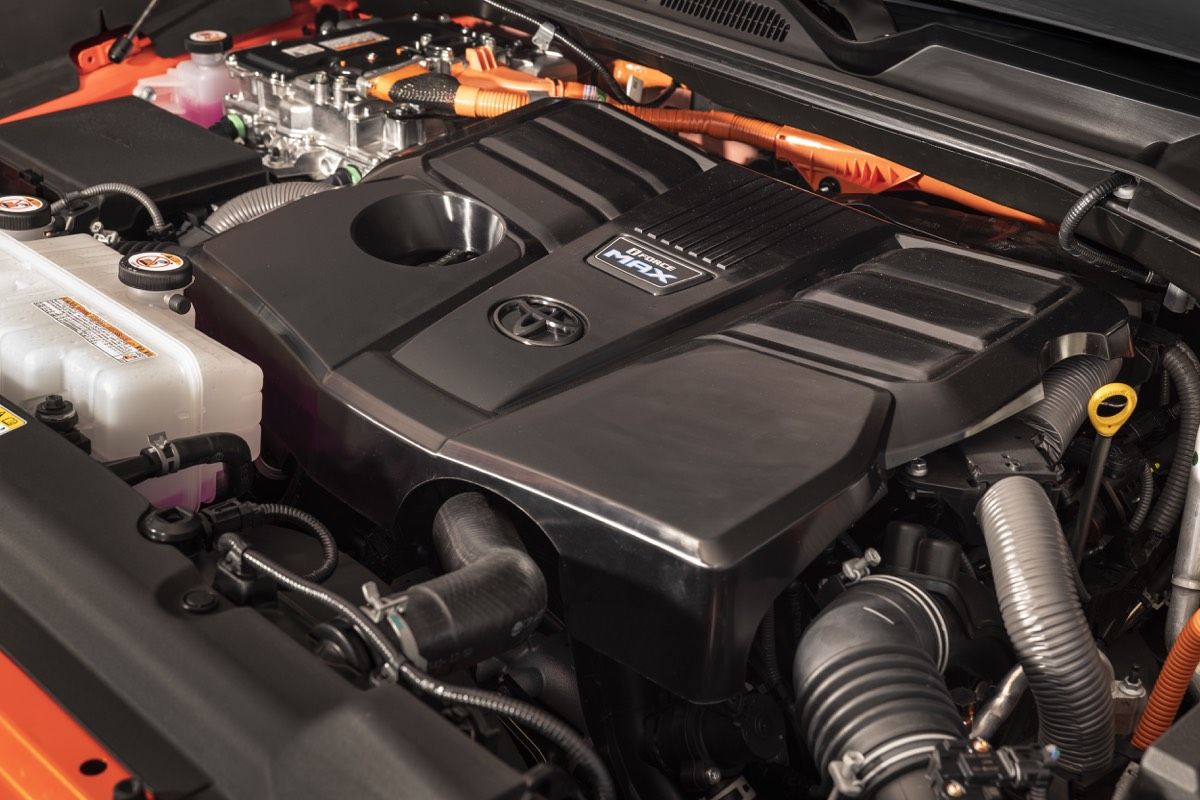 Under the hood of the 2022 Toyota Tundra showing the i-FORCE MAX hybrid twin-turbo V6 engine