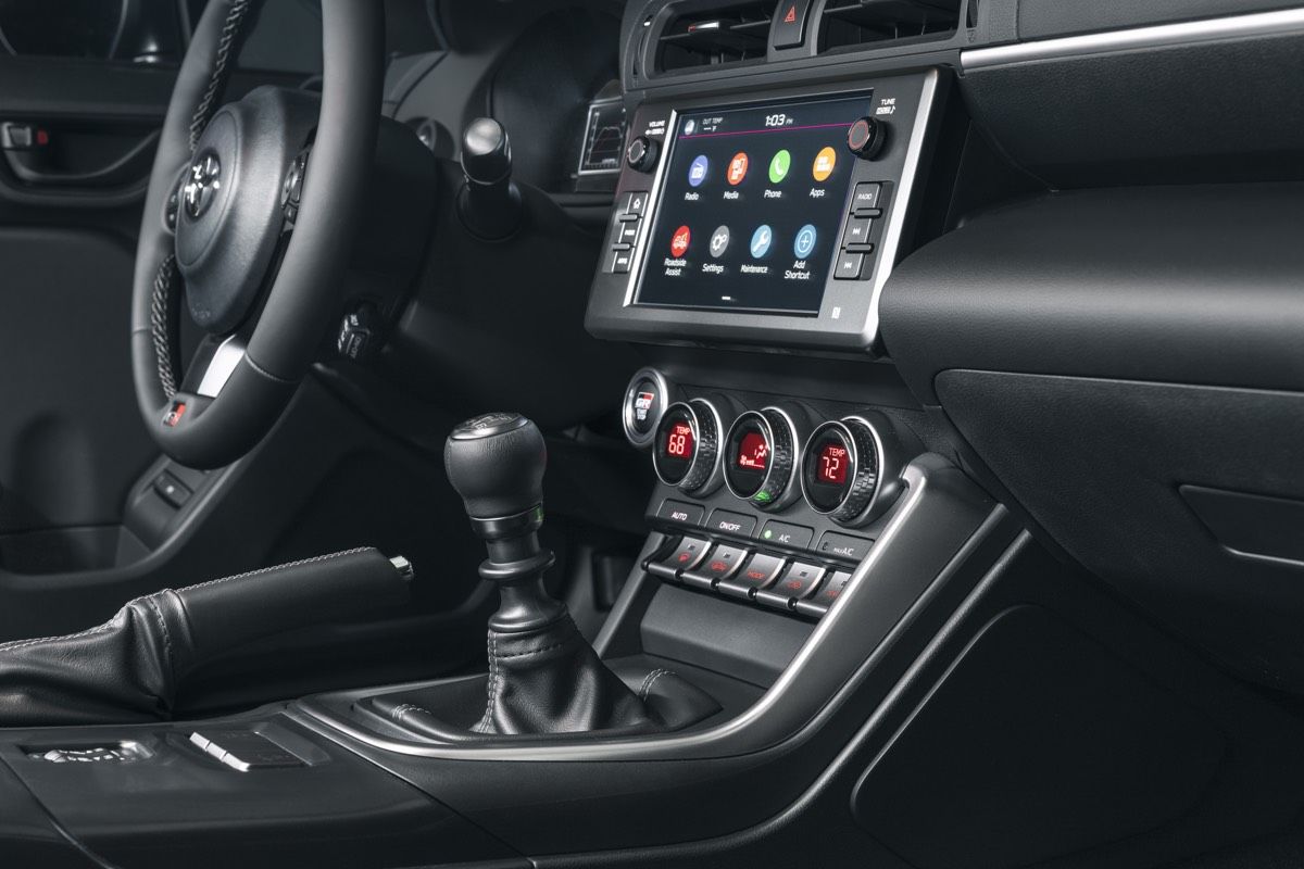 The center console of the 2022 Toyota 86 sedan including adaptive cruise control and touchscreen