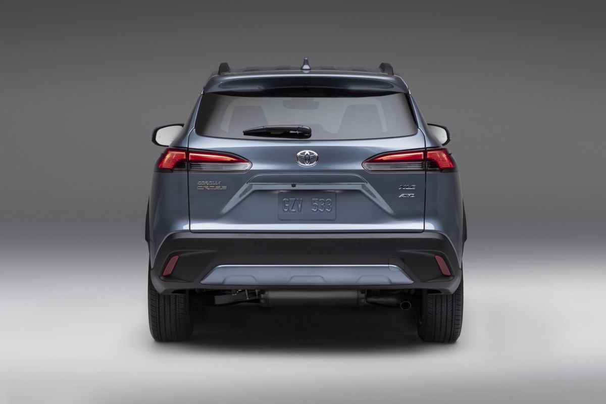 Rear view of the 2022 Toyota Corolla Cross Celestite against a gray background