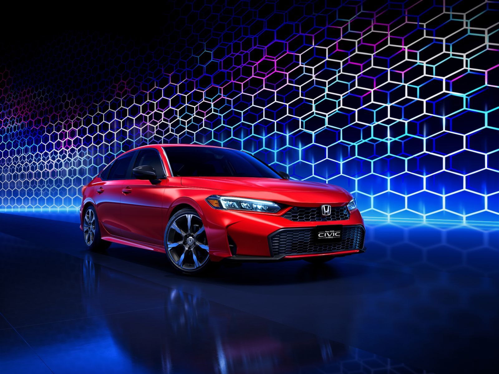 2026 Honda Civic Hybrid - A red Honda Civic Hybrid posed in a studio with a futuristic blue and purple honeycomb light pattern in the background - Orangeville Honda - Honda car dealership in Orangeville, Ontario
