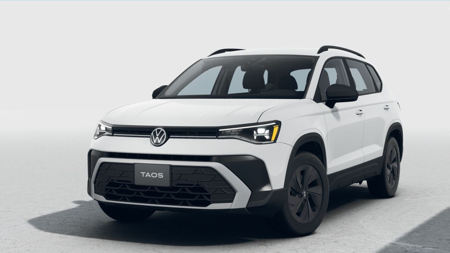2026 Volkswagen Taos - A white 2026 Volkswagen Taos parked in a studio with headlights on - Humberview Volkswagen - New car dealership in Toronto, Ontario