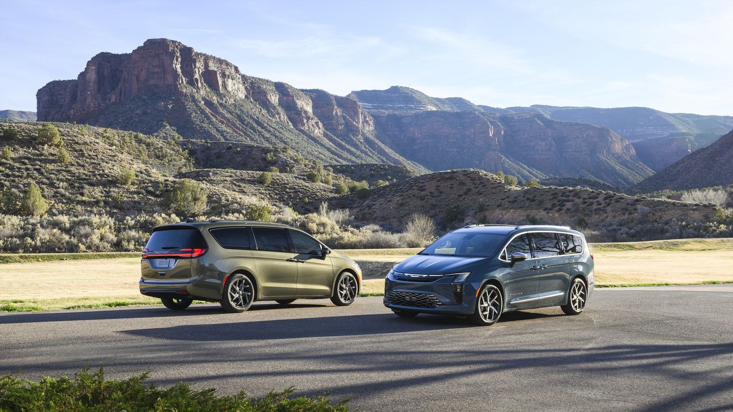 2027 Chrysler Pacifica - green and blue 2027 Chrysler Pacifica minivans parked on a road in front of mountains - Cooksville Chrysler, Jeep, Dodge, RAM - Chrysler new car dealership in Mississauga, Ontario