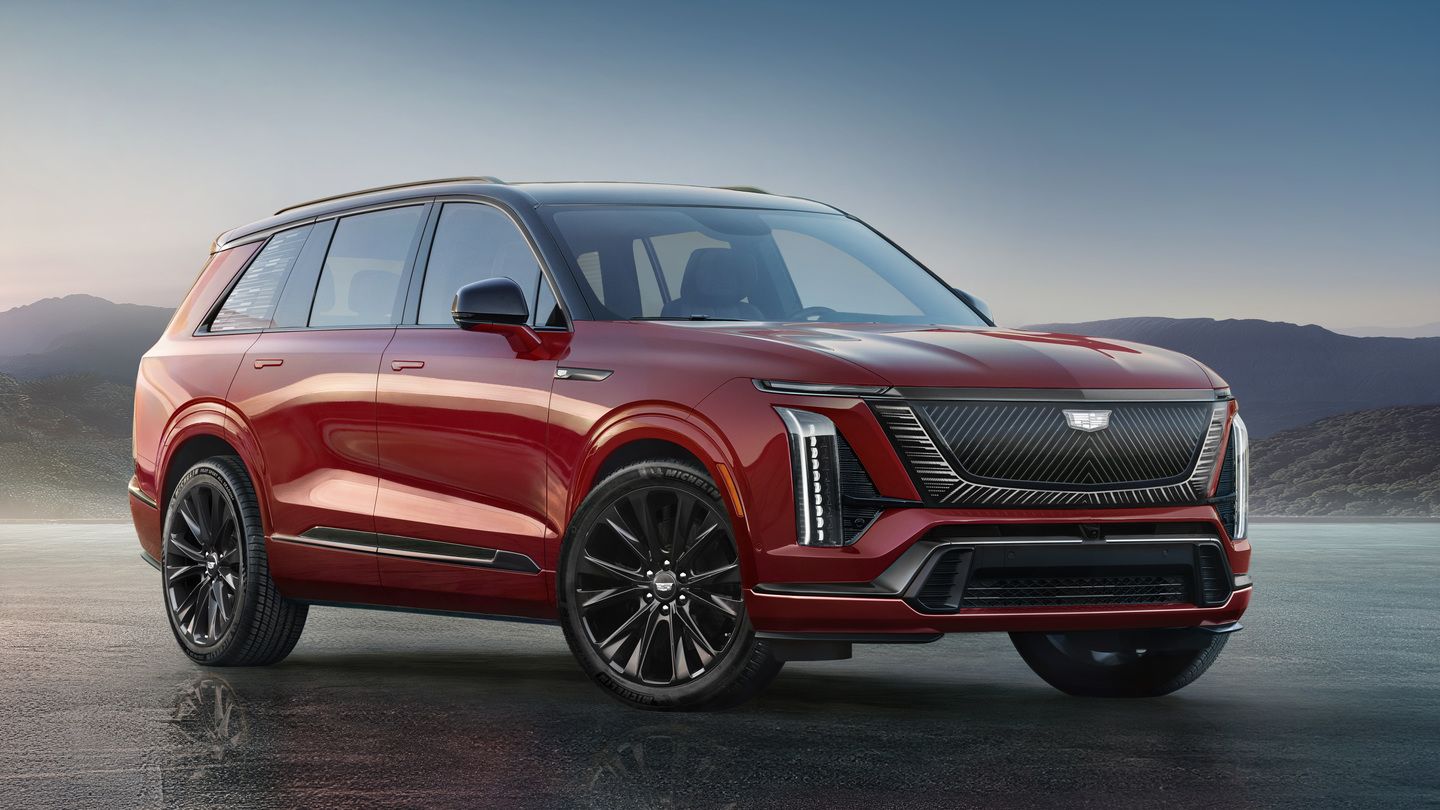 2026 Cadillac VISTIQ - front three-quarter view of a radiant red 2026 Cadillac VISTIQ - Applewood Cadillac - Cadillac new car dealership in Mississauga, Ontario