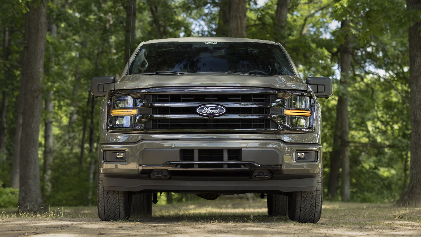 2027 Ford F-150 - front view of a grey 2027 Ford F-150 parked on a dirt path in a wooded area - Humberview Group - New car dealerships in Ontario