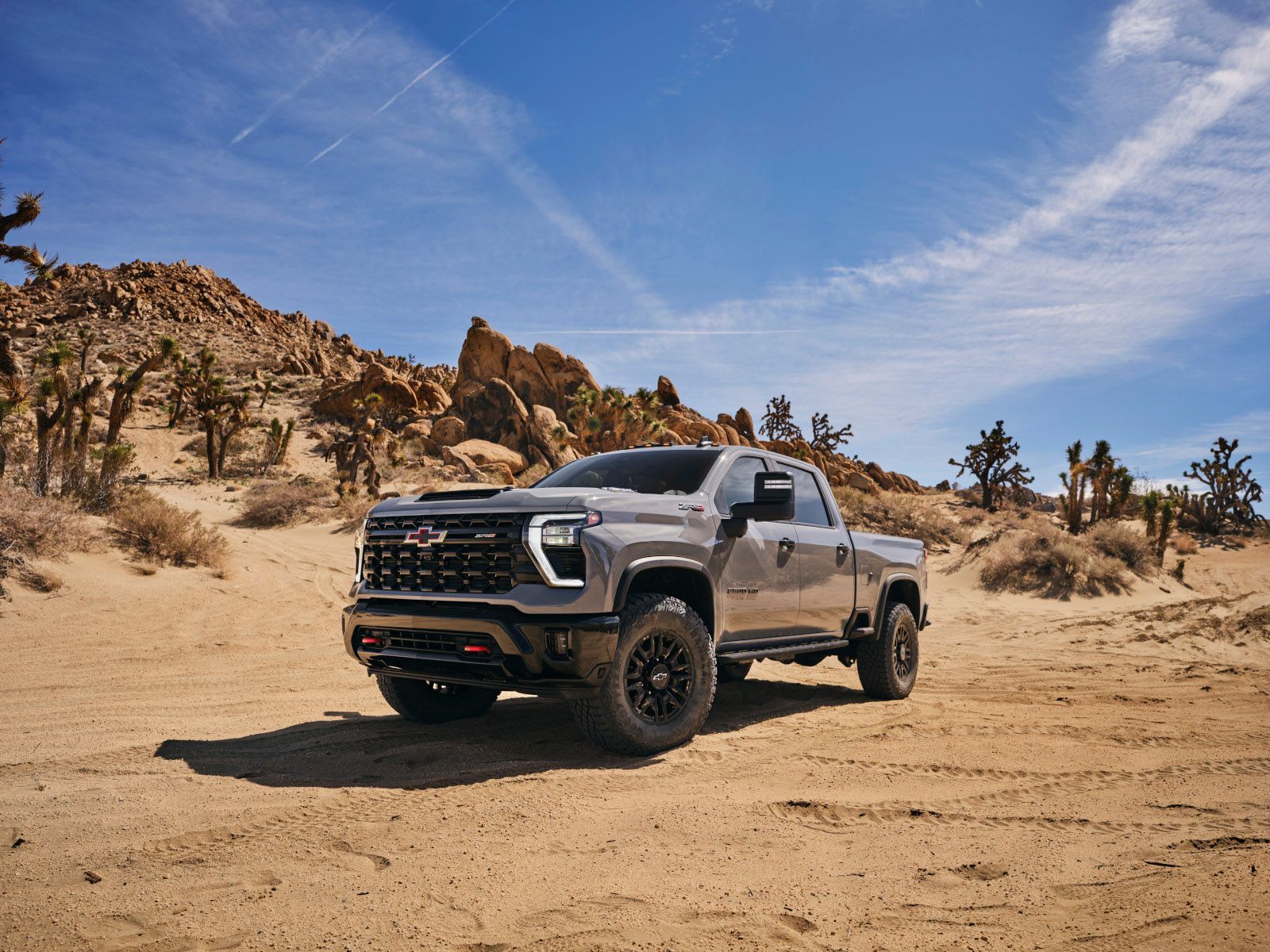 2027 Chevrolet Silverado 2500 HD - a grey 2027 Chevrolet Silverado 2500 HD parked in a desert landscape - Humberview Chevrolet, Buick, GMC - Chevrolet car dealership in Toronto, Ontario
