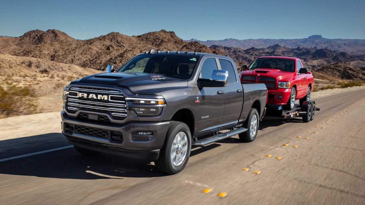 front side view of a 2025 RAM 2500 towing another truck