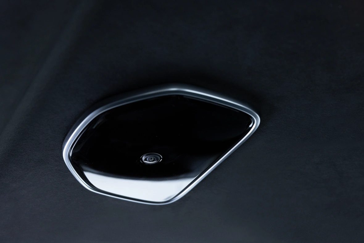 Close-up of the ceiling-mounted FamCAM interior camera in a 2027 Chrysler Pacifica.