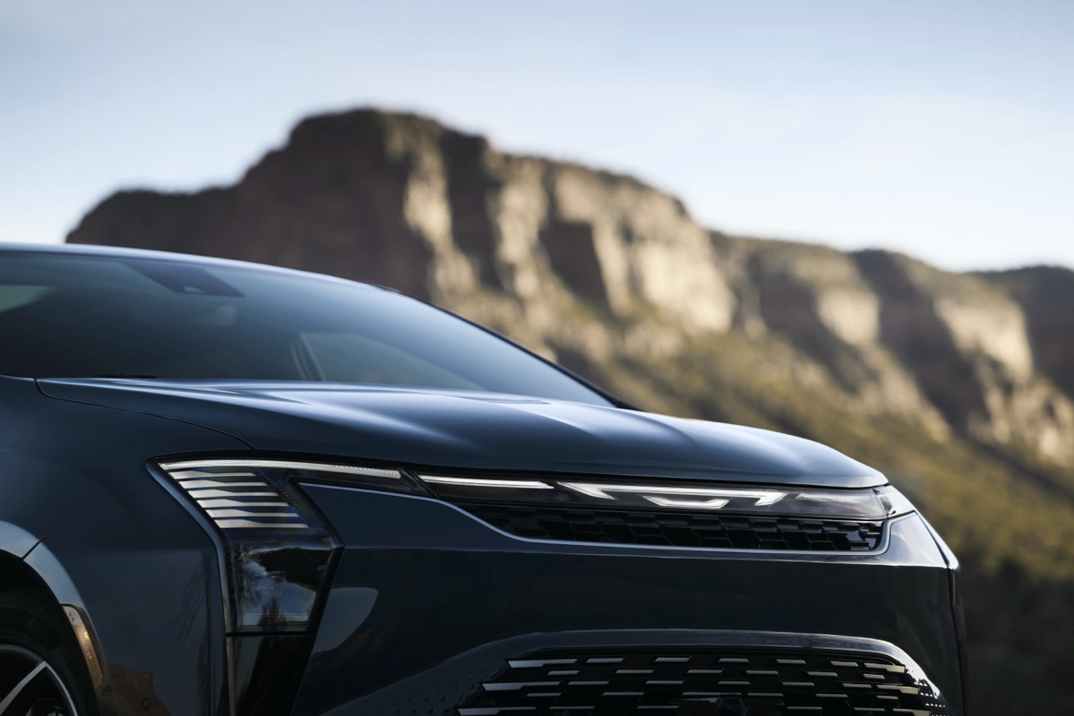 Close-up of the redesigned front grille and LED headlights on the 2027 Chrysler Pacifica.
