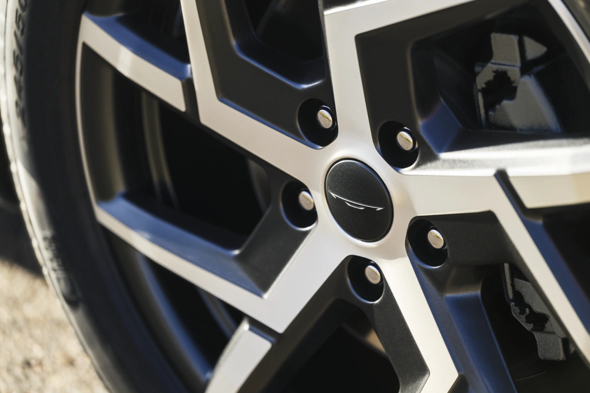 Close-up of a 2027 Chrysler Pacifica alloy wheel with a Chrysler centre cap.