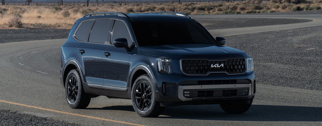 front side view of a 2023 Kia Telluride on a snaking road