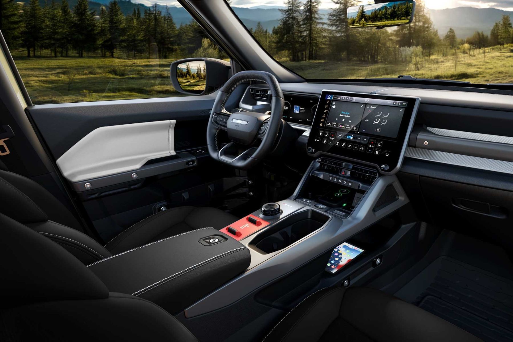 Poste de conduite du Jeep Recon 2026 avec tableau de bord num&eacute;rique et &eacute;cran central.
