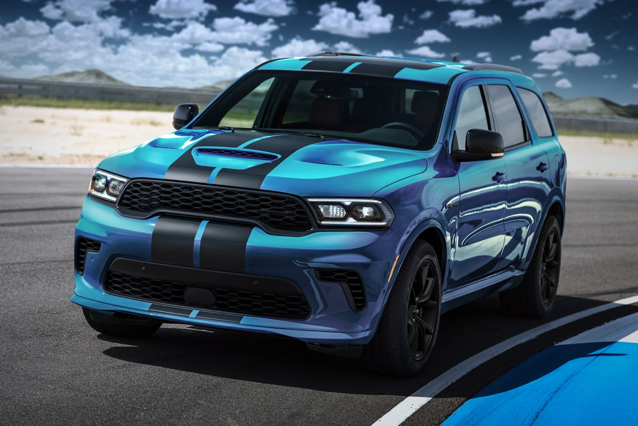 Blue 2026 Dodge Durango SRT front three-quarter view on a test track.
