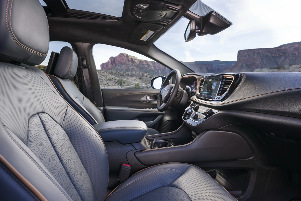 Interior of the 2027 Chrysler Pacifica with Uconnect multimedia system.