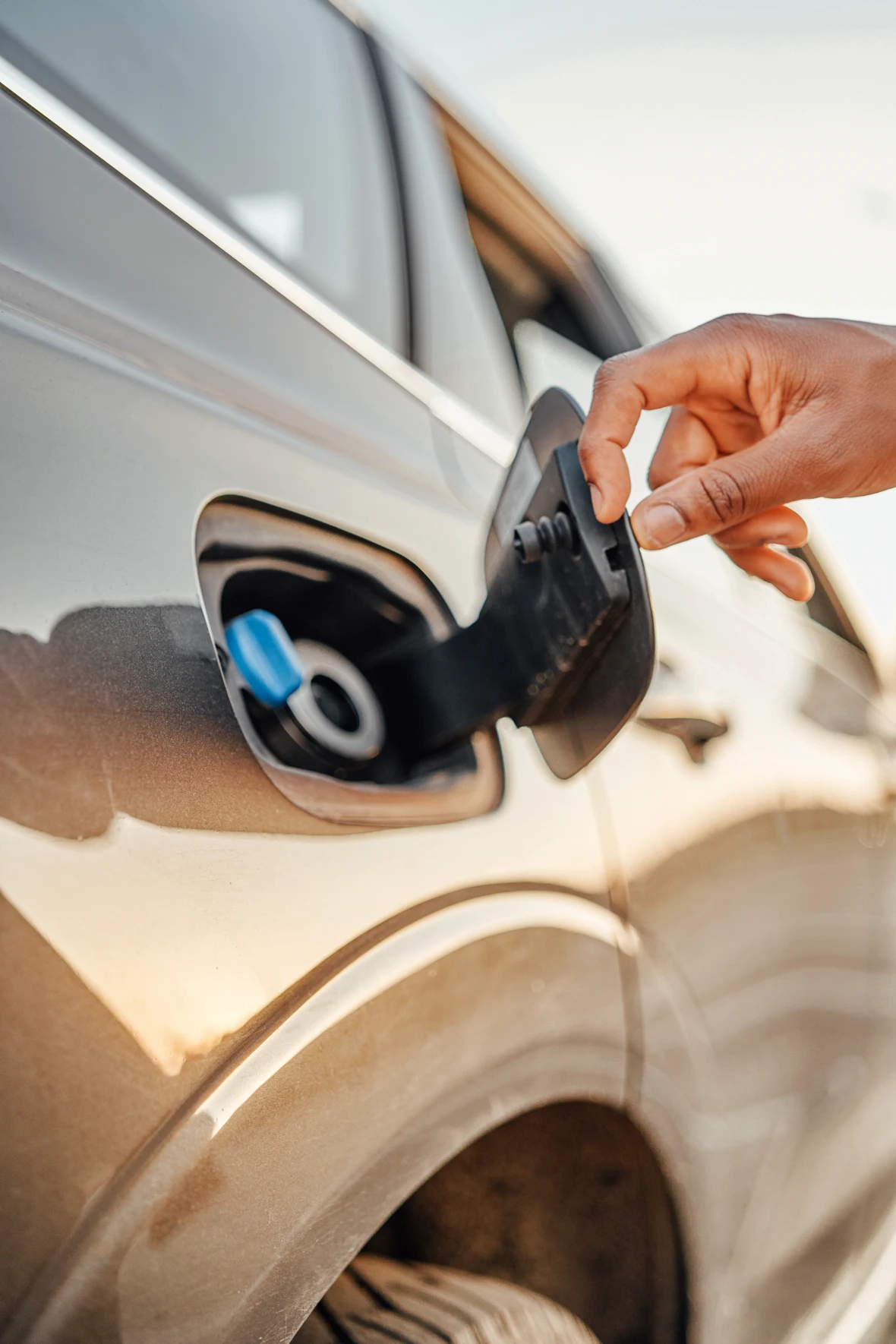 Filling the fuel tank of a hybrid car.