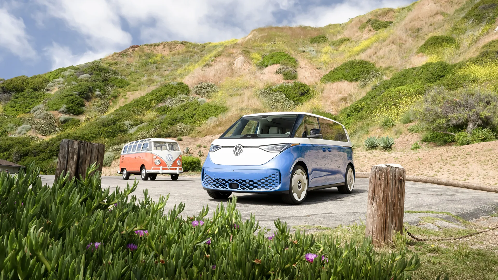 Blue and white Volkswagen ID. Buzz parked on a beach